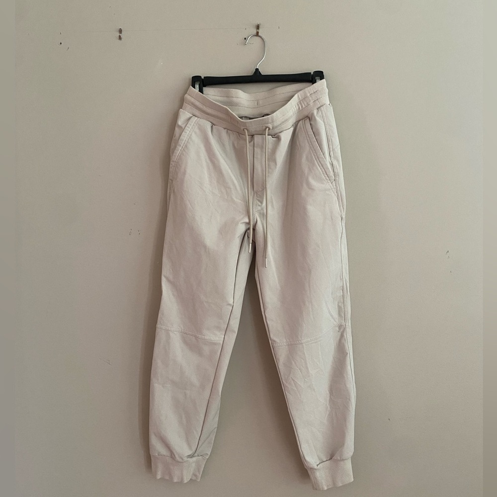 White stretchtech parachute pants size s